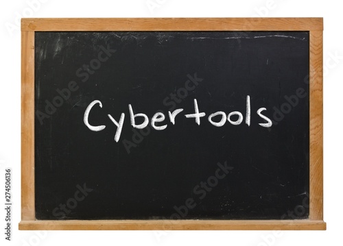 Cybertools written in white chalk on a black chalkboard isolated on white
