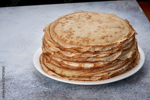 fresh pancakes on a plate white background