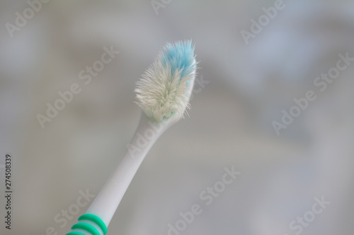 Incomplete toothbrush on a white background.