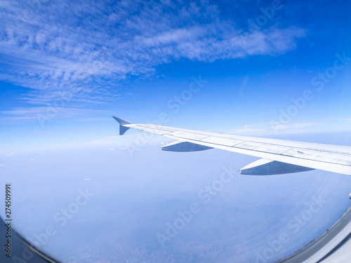 The looking at aircraft wing view from windows