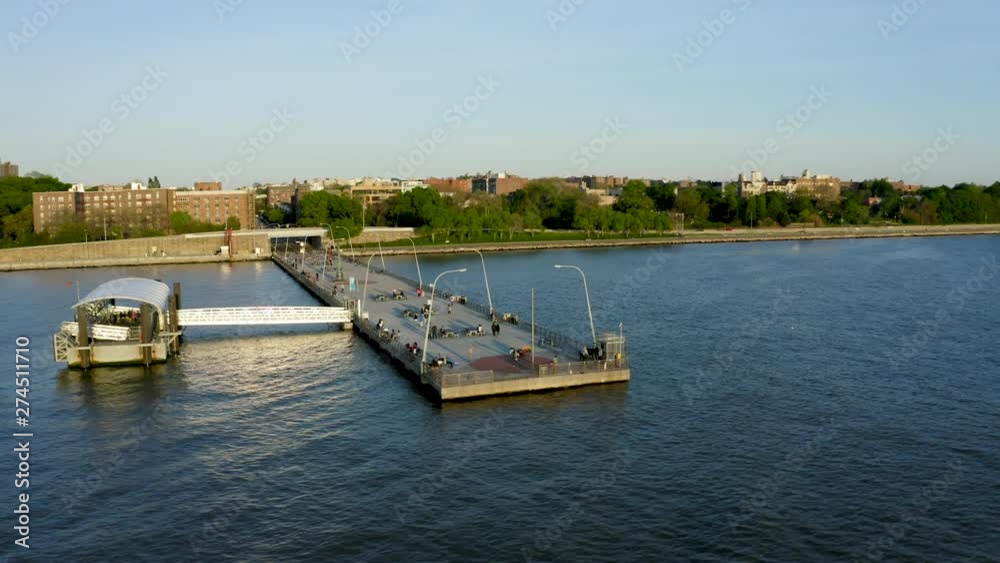 Aerial Establishing Shot of Pier next to an Urban Neighborhood Aerial Establishing Shot of Pier next to an Urban Neighborhood