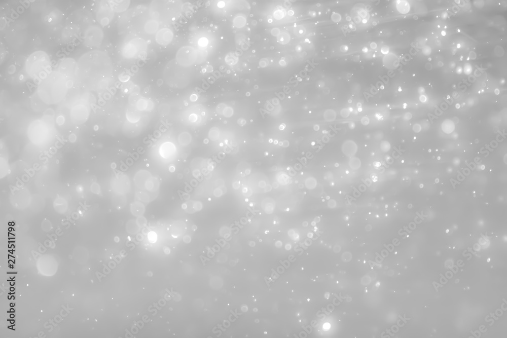 White and Silver lights on bokeh abstract background.