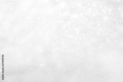 White and Silver lights on bokeh abstract background. © phoomiphat