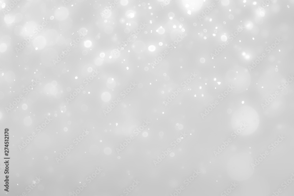 White and Silver lights on bokeh abstract background.