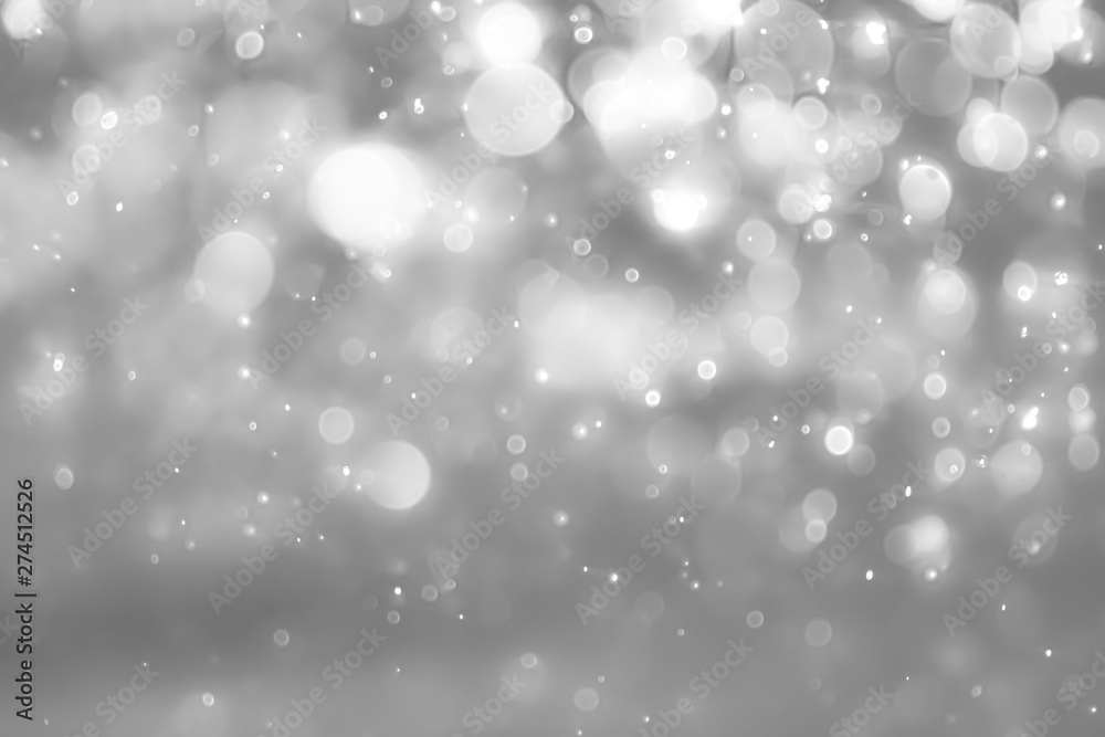 White and Silver lights on bokeh abstract background.