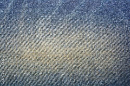 Shabby denim texture for background. Blue jeans