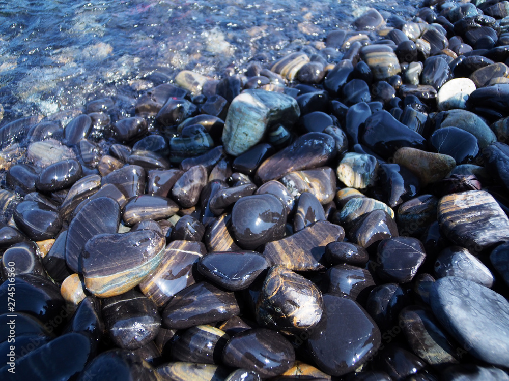 Cloes up Beach Black Rocks in Lipe, Thailand Cloes up Beach Black Rocks in Lipe, Thailand