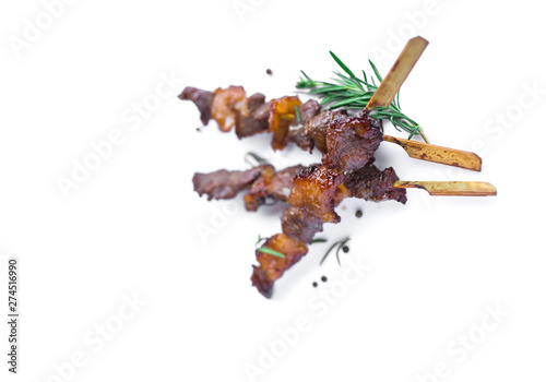 Grilled beef meat with rosemary and pepper isolated