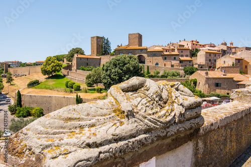 Quadro su tela Tuscania, Viterbo, Italy: view of the city with etruscan sarcophagi