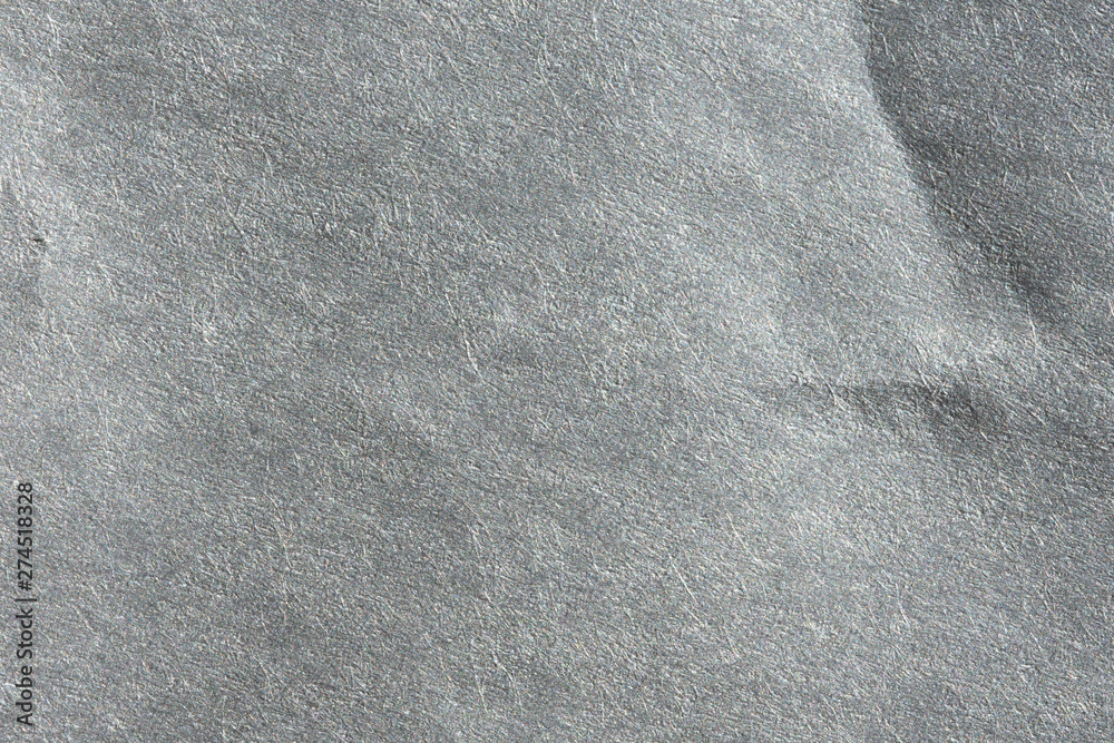 Macro image of gray newsprint