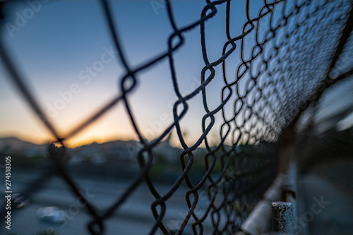 bokeh fence sunset