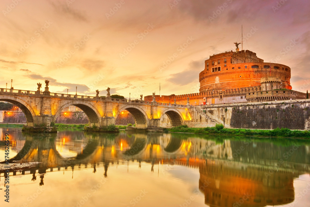 View of the Castel Sant'Angelo and Aelian Bridge in Rome at sunset.