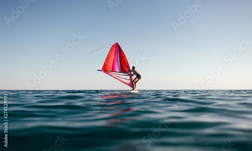 Windsurfer sailing on the windsurf board