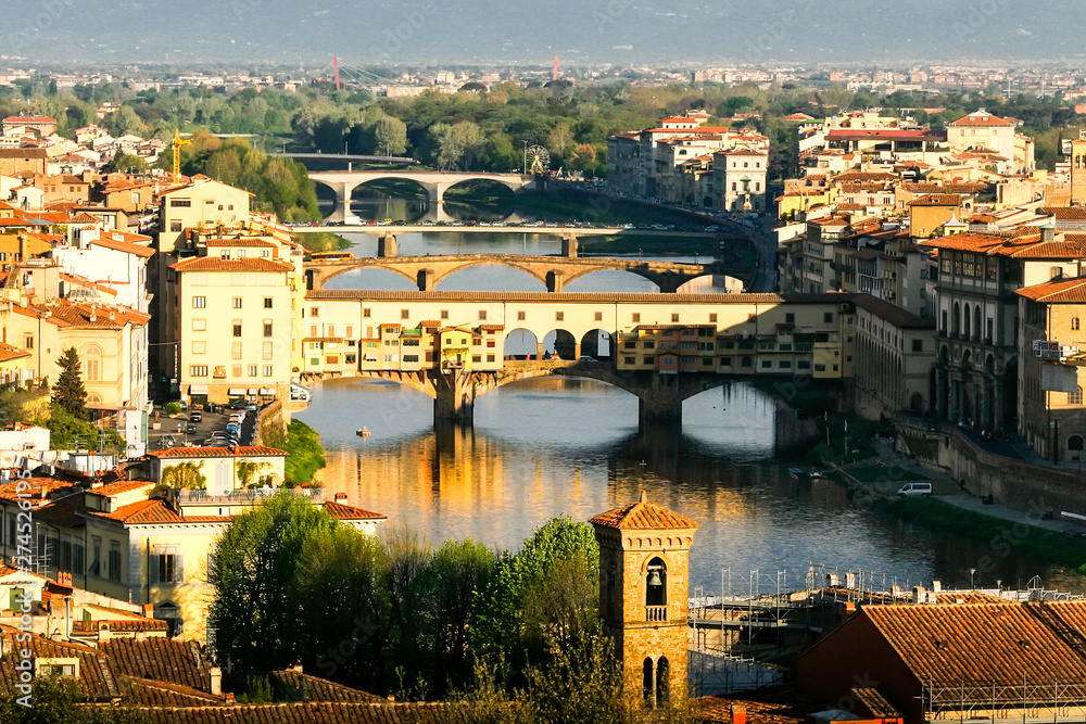 Panorama of Florence with Ponte Vecchio (Old Florence Bridge) on river Arno from Piazzale Michelangelo in Florence, Tuscany, Italy. April 2012