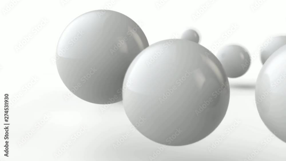 3D animation of the movement of white balls of different sizes in front of the camera lens.