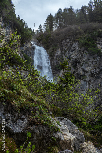 View of the waterfall near Lenzerheide in the Swiss Alps in a sunny spring day - 5