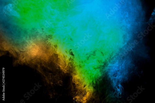 Movement of smoke. Abstract green blue color smoke on black background. Abstract Smoke Clouds.