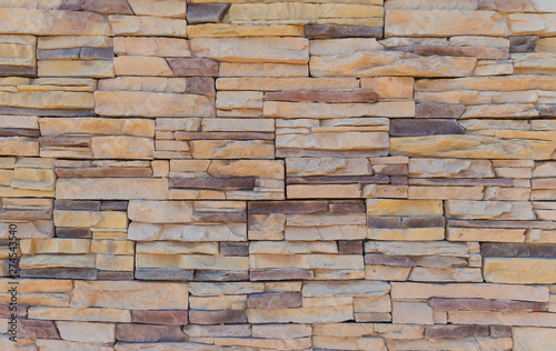The texture of the wall of a variety of colored stones