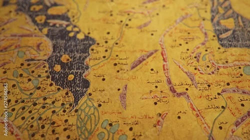 Al-Idrisi's Tabula Rogeriana Middle East Map created in 1154, the most advanced medieval world maps, shallow depth of field close-up slow tilt up CGI shot.