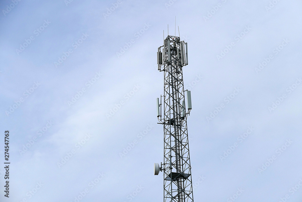 telephone base station mast, two telephone base station towers, big signal base station,