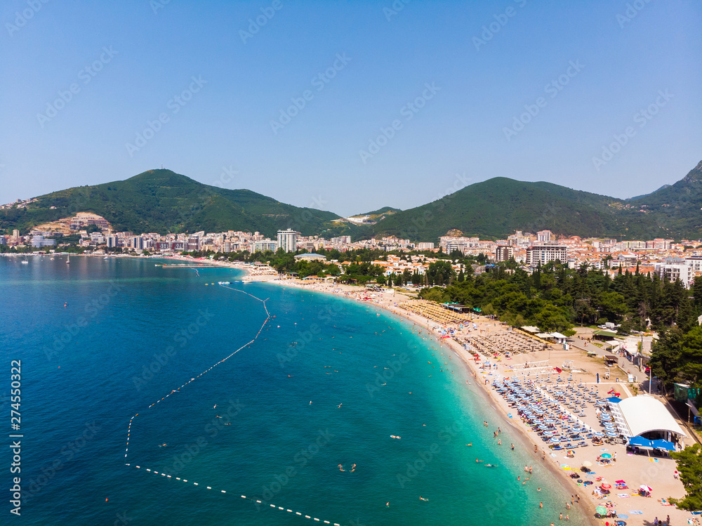 Obraz premium Aerial view of long coastline of Budva city, Montenegro. Balkans, Adriatic sea, Europe
