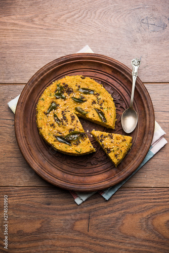 Handvo/handwa is a vegetable cake originating from the Gujarat, India. selective focus photo