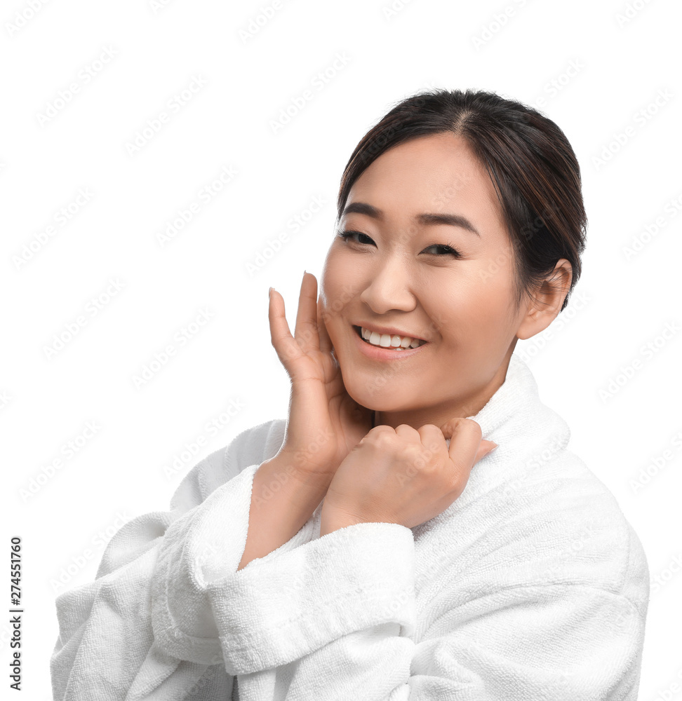 Portrait of beautiful Asian woman in bathrobe isolated on white. Spa treatment Portrait of beautiful Asian woman in bathrobe isolated on white. Spa treatment