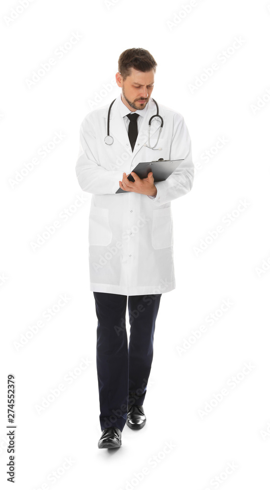 Full length portrait of male doctor with clipboard isolated on white. Medical staff Full length portrait of male doctor with clipboard isolated on white. Medical staff