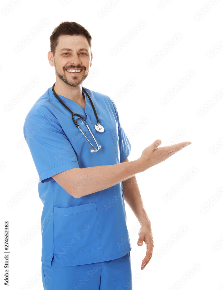 Portrait of smiling male doctor in scrubs isolated on white. Medical staff Portrait of smiling male doctor in scrubs isolated on white. Medical staff