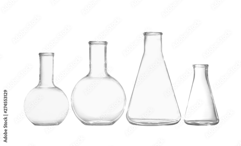Group of empty chemistry glassware isolated on white