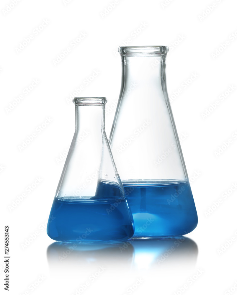 Conical flasks with liquid samples on white background. Chemistry glassware Conical flasks with liquid samples on white background. Chemistry glassware