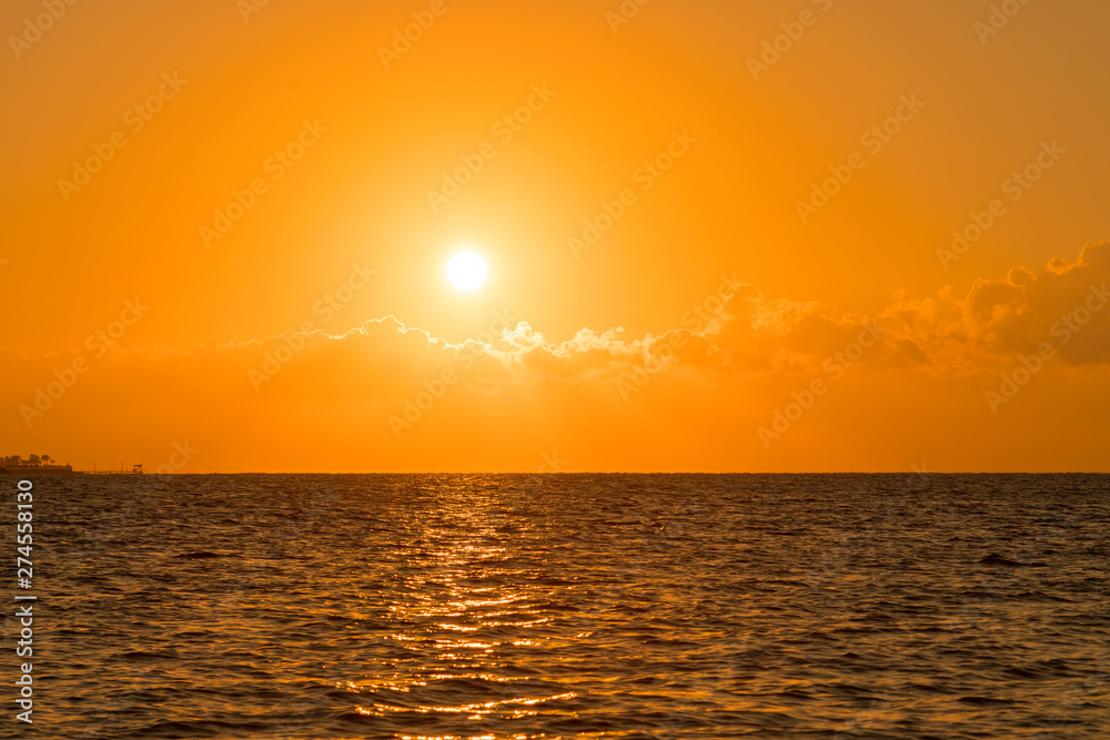 Colorful dawn over the sea, Sunset. Beautiful magic sunset over the sea. Beautiful sunset over the ocean. Sunset over water surface.