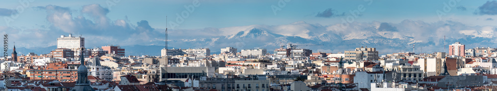 Panoramic of Madrid with the Sistema Central Mountain Range in the background