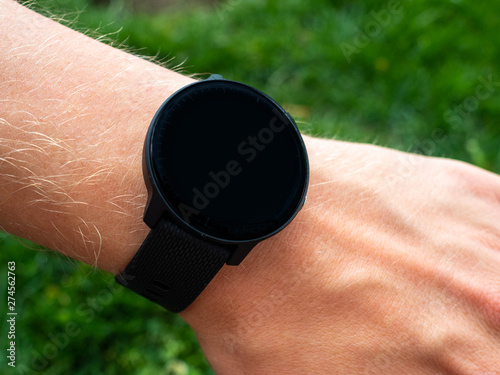 Smart watch with blank face on mans wrist
