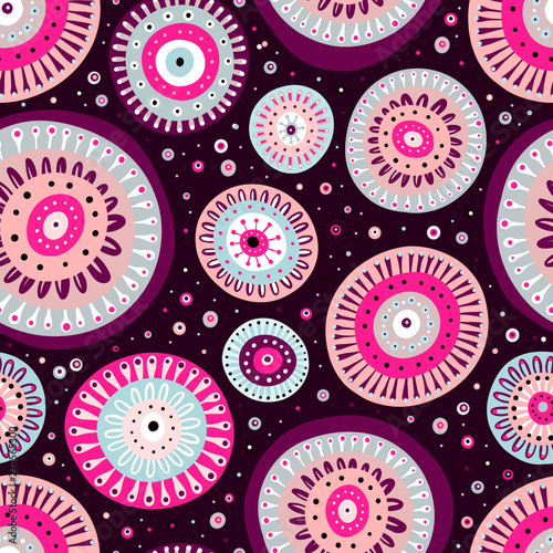 Ornamental colourful circles with leaves and dots on maroon background