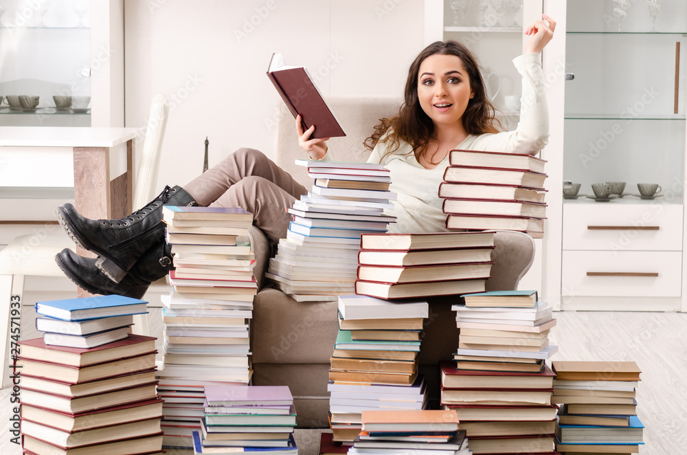 Young female student preparing for exams at home Young female student preparing for exams at home