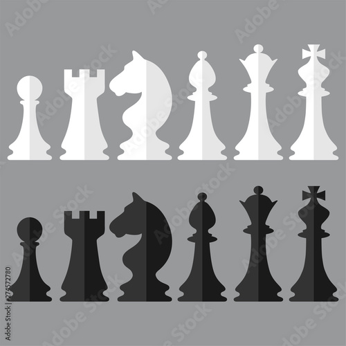 Stampa su tela Set of black and white chess pieces icons in paper style isolated on the gray background
