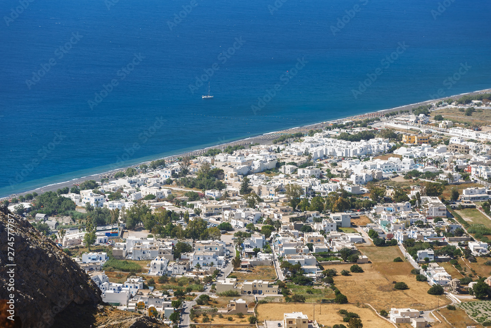 Beautiful Perissa Black Sand Beach, Greece, Cyclades islands, Santorini island, aerial view