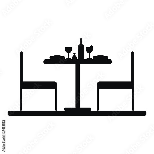 Silhouette of a table setting for two. Icon. Isolated on white background.
