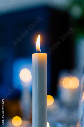 yellow light white candles and candles