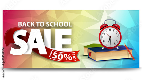 Back to school sale, horizontal discount web banner for your website with school books and alarm clock