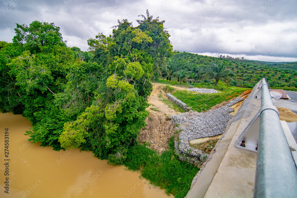 Water pollution caused by mud from logging activities in river at Malaysia Water pollution caused by mud from logging activities in river at Malaysia
