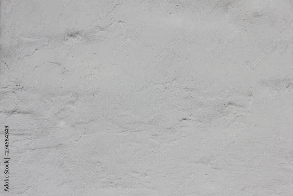 Obraz premium White old concrete wall grunge rustic textured background of seamless stone facade detail with empty copy space 