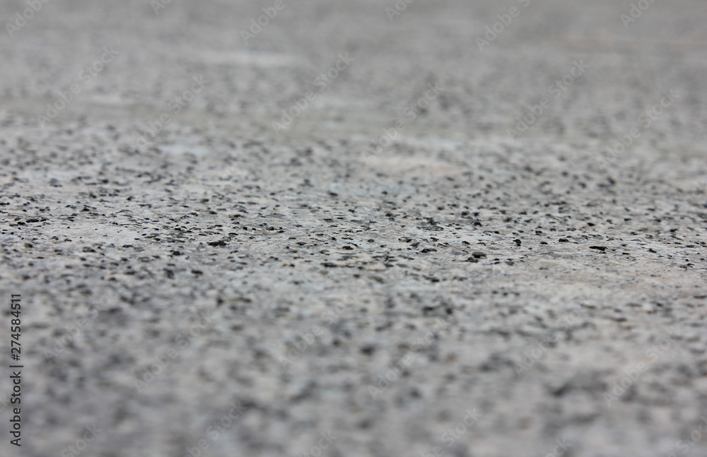 Grey granite stone texture background of seanless mineral stone with selective focus Grey granite stone texture background of seanless mineral stone with selective focus