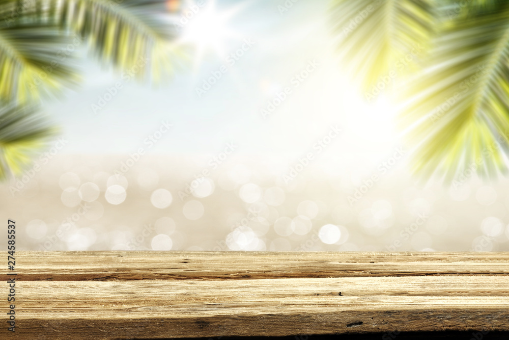 Desk of free space and summer background of beach Desk of free space and summer background of beach