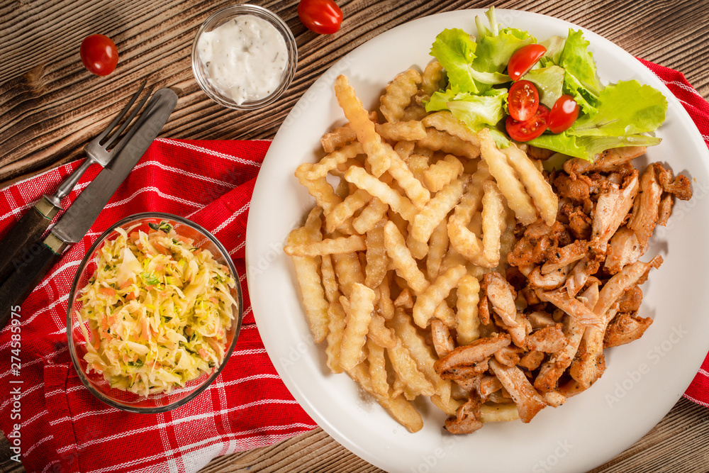 Greek gyros dis with fries and salad