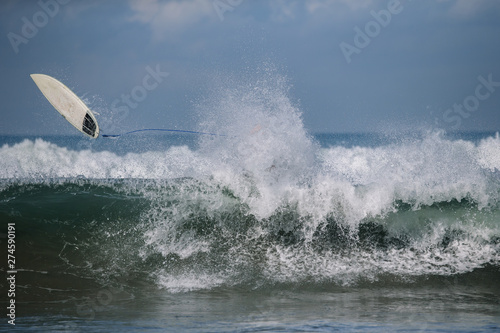 Surfer's crash on the wave