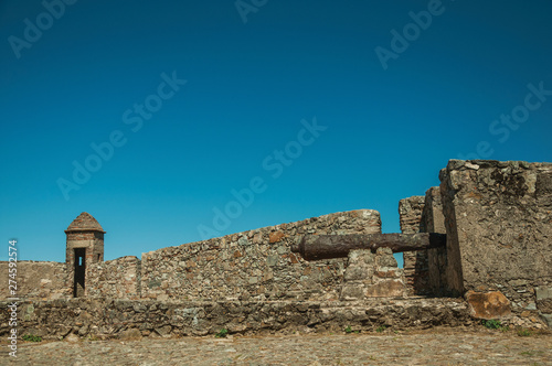 Iron cannon on the wall of stronghold next to the Marvao Castle