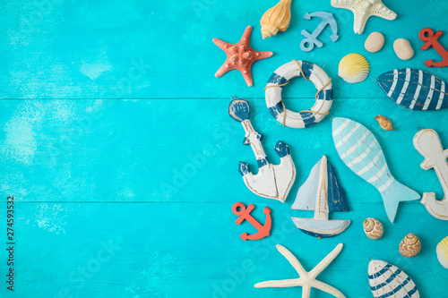 Summer background with nautical and marine decorations on wooden table.