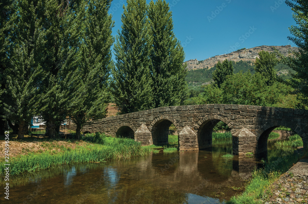 Old Roman stone bridge over the Sever River in Portagem Old Roman stone bridge over the Sever River in Portagem